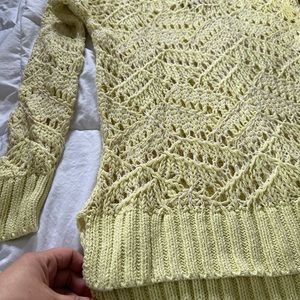 Yellow knitted sweater